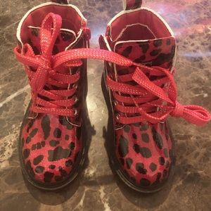 Pink and black boots